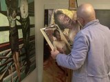 فنان ايطالي يرسم القذافي بعد وفاته