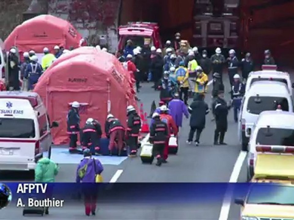 Rescuers search for missing in Japan tunnel collapse