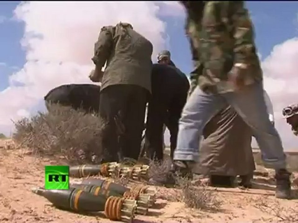 Video of French jets bombing Libya ammunition dump, rebels fire rockets