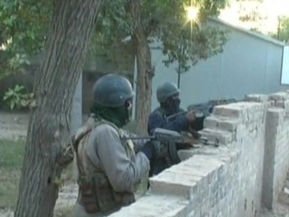 Taliban suicide bombers attack Pakistan police station