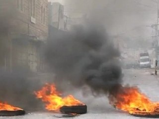Tear gas blankets Hebron amid clashes