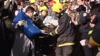Woman killed in China building collapse