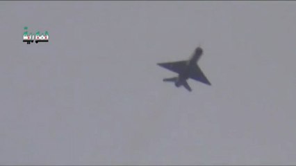Syrian Assad Mig-21 Dropping Two Bombs on Rebels