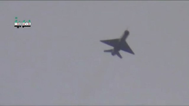 Syrian Assad Mig-21 Dropping Two Bombs on Rebels