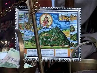 2208.Sadhu baba listening music during havan.mov