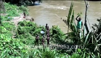 Children playing near river Congo