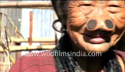 Apatani women cooking pig