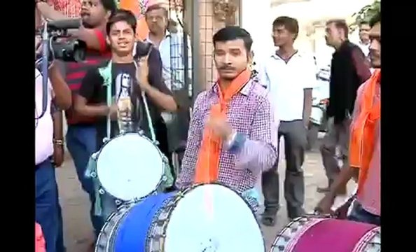 Supporters celebrate Modi's landslide win