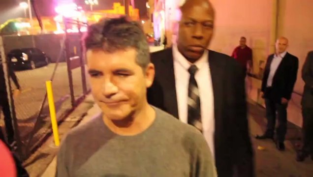 Simon Cowell Admits He's 'Dating' Carmen Electra