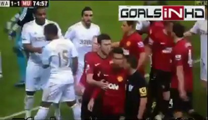 Ashley Williams Kicks the ball at Robin van Persie's head