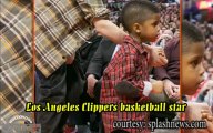 Justin Bieber Babysitting at a Basketball Game