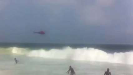 Helicopter crashes into the sea off Copacabana Beach