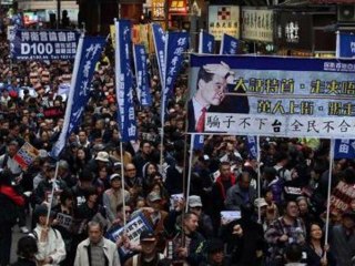 Protesters demand resignation of HK chief executive