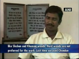 Tribal artists create a wooden copy of the Holy Bible.mp4