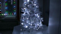 Weihnachten schneiender Weihnachtsbaum weiß silber mit viel Schnee Snowing X-Mas Tree