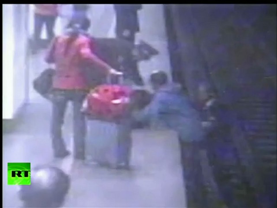 CCTV: Woman falls on train track in China, rescued by passenger