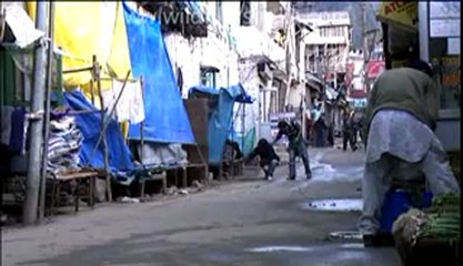 Boy selling bread and washing utensils.flv