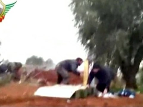 Syrian rebels target military base with rockets.