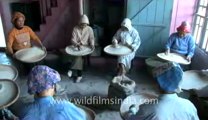 Mizoram-largest family-Women sieving rice-2.flv
