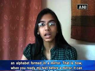 Girl pens down Ramacharita Manas in 'mirror writing'.mp4