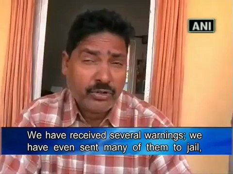 Maoists paste posters against police officials.mp4