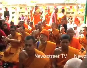 Budhhist Monks in India Pray for Tsunami Victims In Japan.mp4