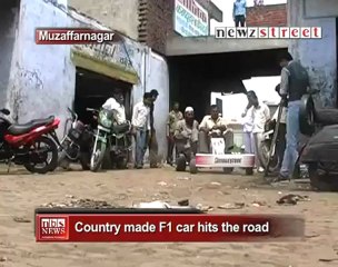 Country made F1 car hits the road.mp4