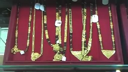 Gold price dips by Rs 38.mp4