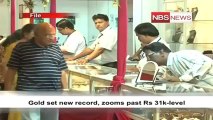 Gold set new record, zooms past Rs 31k level.mp4