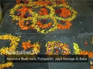 Narendra Modi visits Puttaparthi, pays homage to Baba.mp4