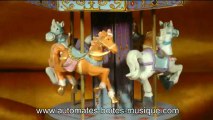 Lutèce Créations, spécialiste des boîtes à musique et des automates présente un carrousel musical miniature de sa collection de manèges musicaux animés (carrousels, grandes roues et autres manèges miniatures).