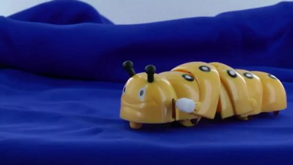 Jouet mécanique automate chenille rampante