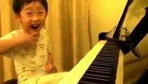 Five Year Old Piano Player