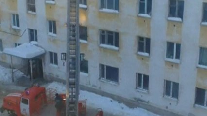 Fireman knocked down ladder by massive chunk of snow