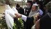 Worshippers Re-enact Baptism Of Jesus Christ In The Jordan River