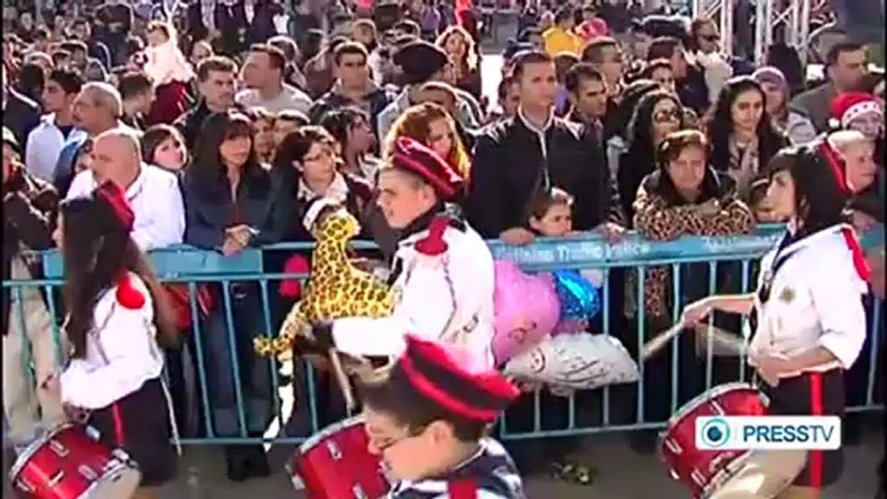 Thousands of people from around the world celebrating Christmas in Bethlehem