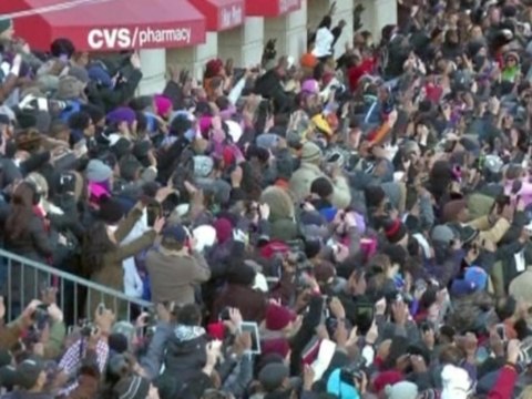 No shortage of enthusiasm as Obamas hit the streets on inauguration day