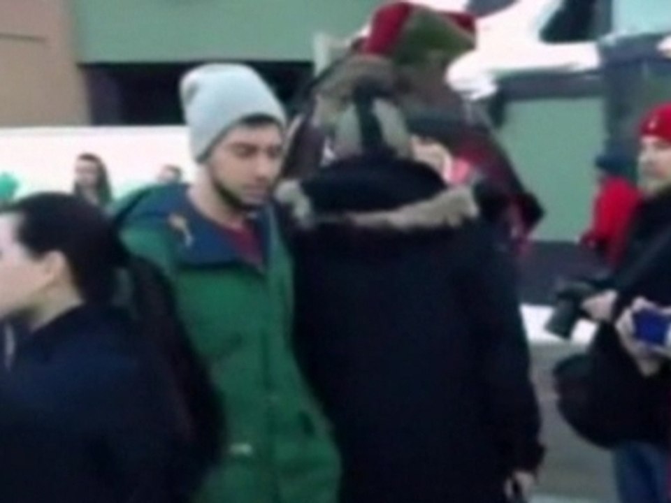 Man rides camel in Sundance protest