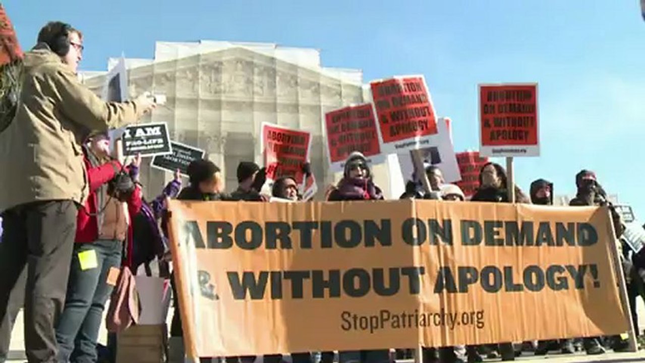 Pro-life, pro-choice activists mark Roe v Wade anniversary