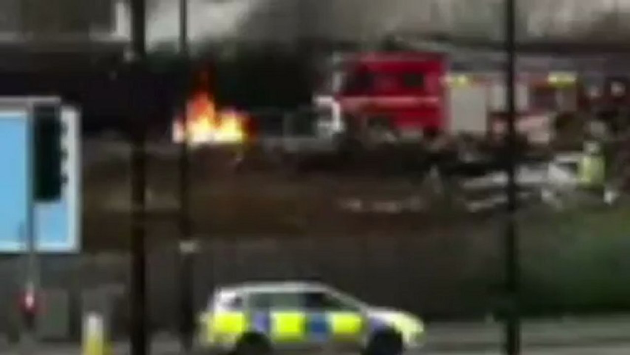 Train derails and catches fire in Manchester
