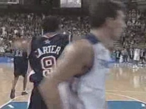 Vince Carter dunks over a 7 2 guy