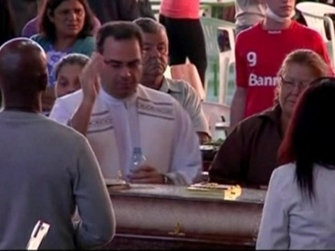 Brazilians grieve for victims of club fire