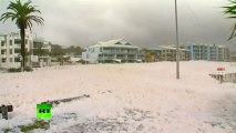 Sea foam fun: Cyclone turns Australian beach into bubble bath