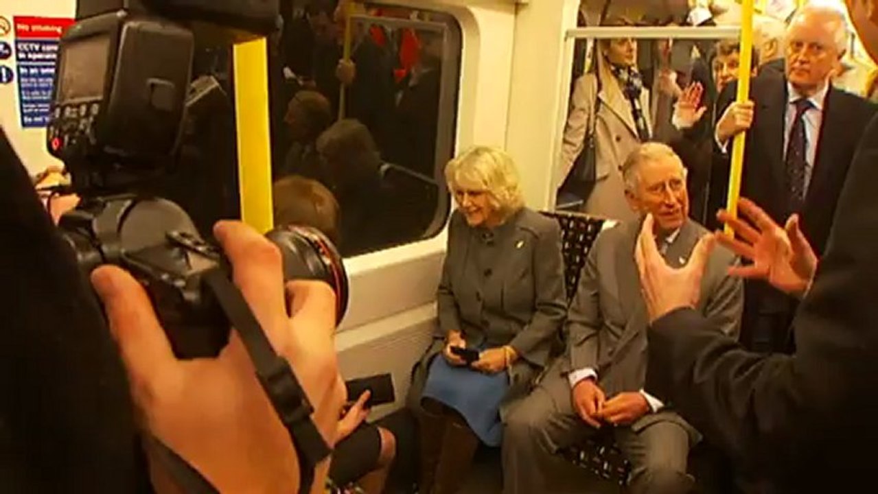 Prince Charles and the Duchess of Cornwall take the Tube