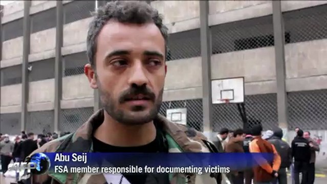 Calls for revenge as Aleppo buries massacre dead