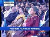 President Mukherjee felicitates Social Impact awardees.