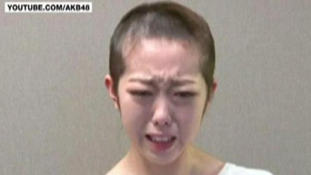 Japanese singer shaves head after sex scandal photo