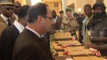France's Hollande visits library housing torched manuscripts in Timbuktu