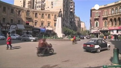 Egyptian police beat naked man as opposition demands...