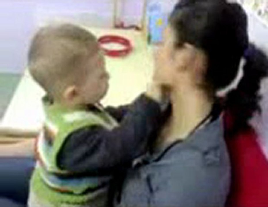 Baby Kissing a Girl